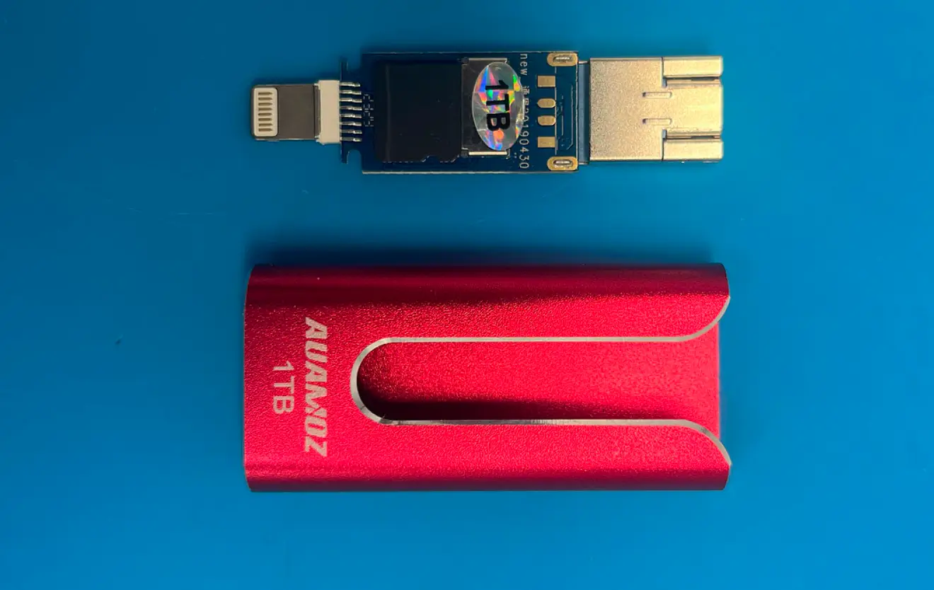 An image of an SD card enclosed in a fake flash drive