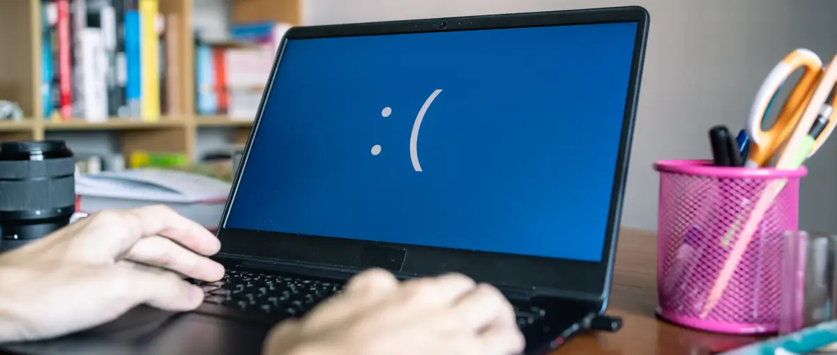 person using a laptop that encountered a Windows Startup Repair Error