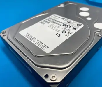 An image of a Toshiba hard disk drive on a table.