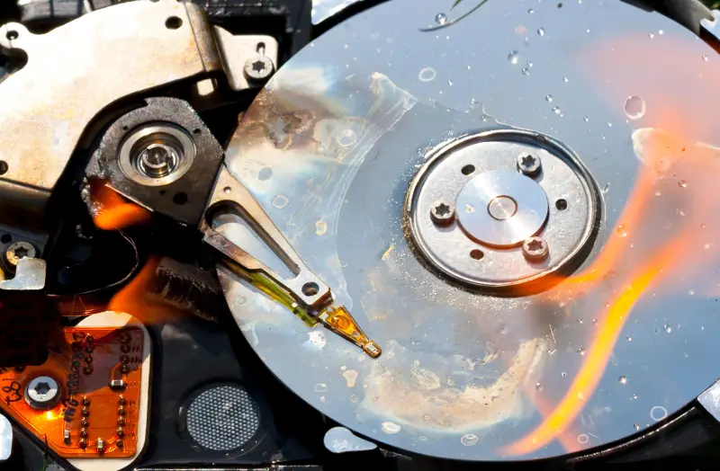 An image of the inside of a hard drive with fire damage.