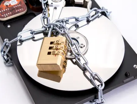 A lock over a hard disk drive symbolizing encrypted data.